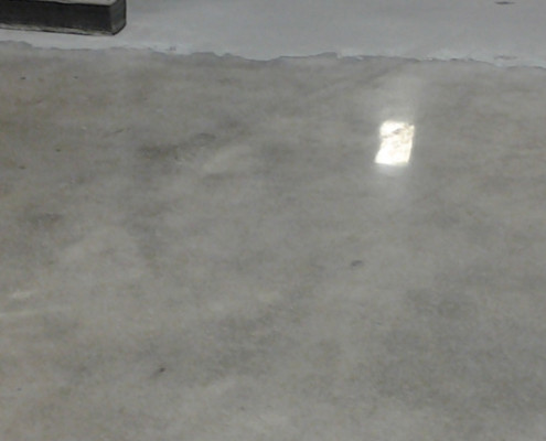 Industrial facility after epoxy floor removal and concrete polished