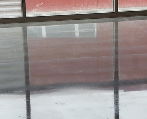 High gloss sheen on concrete floor at school Clinton, IA