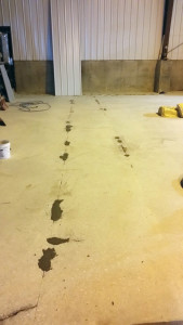 Filled concrete cracks with patch and repair process