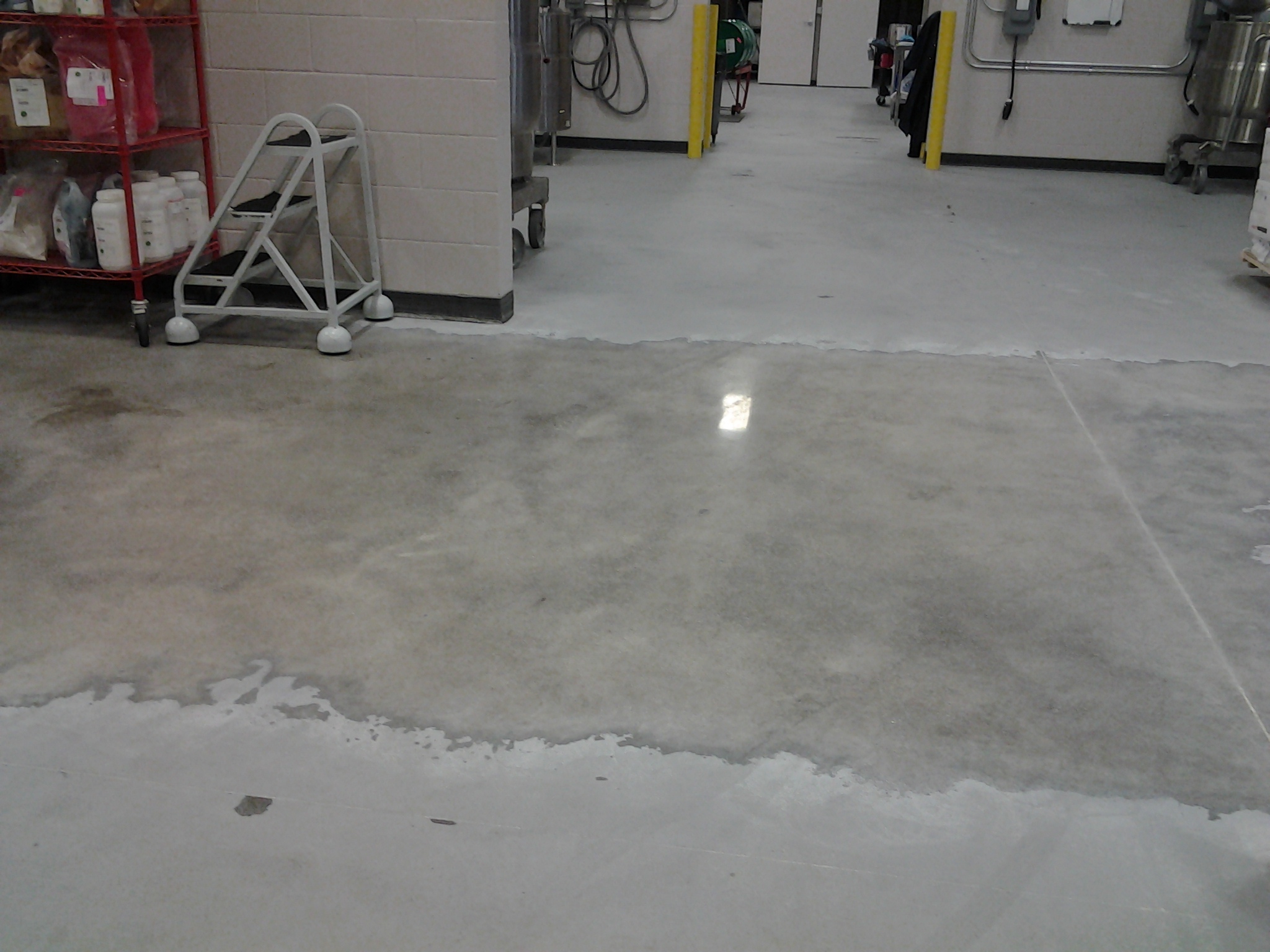 Industrial facility after epoxy floor removal with polished concrete in Cedar Rapids, Iowa