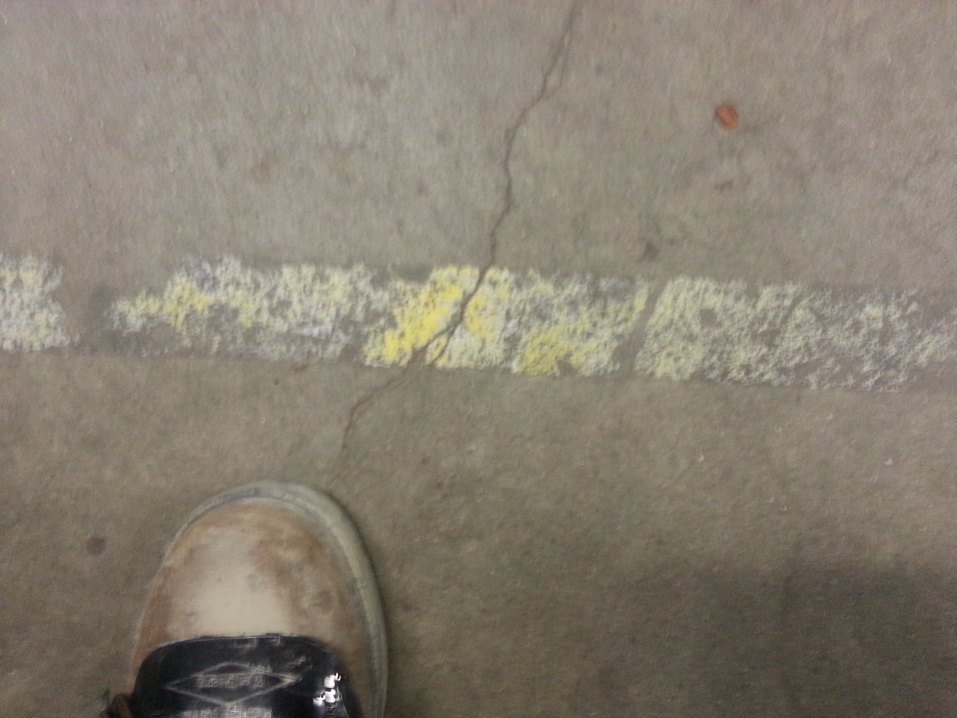 Old faint line striping on epoxy floor